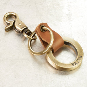 Faith Leather Keychain on Table